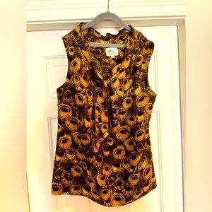 Excellent condition - gold, black and pink print.